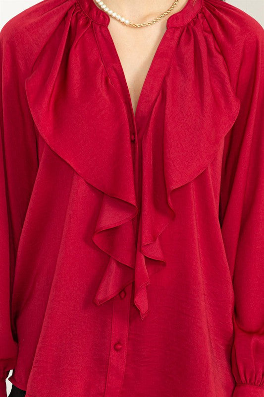 Blusa con volantes manga larga