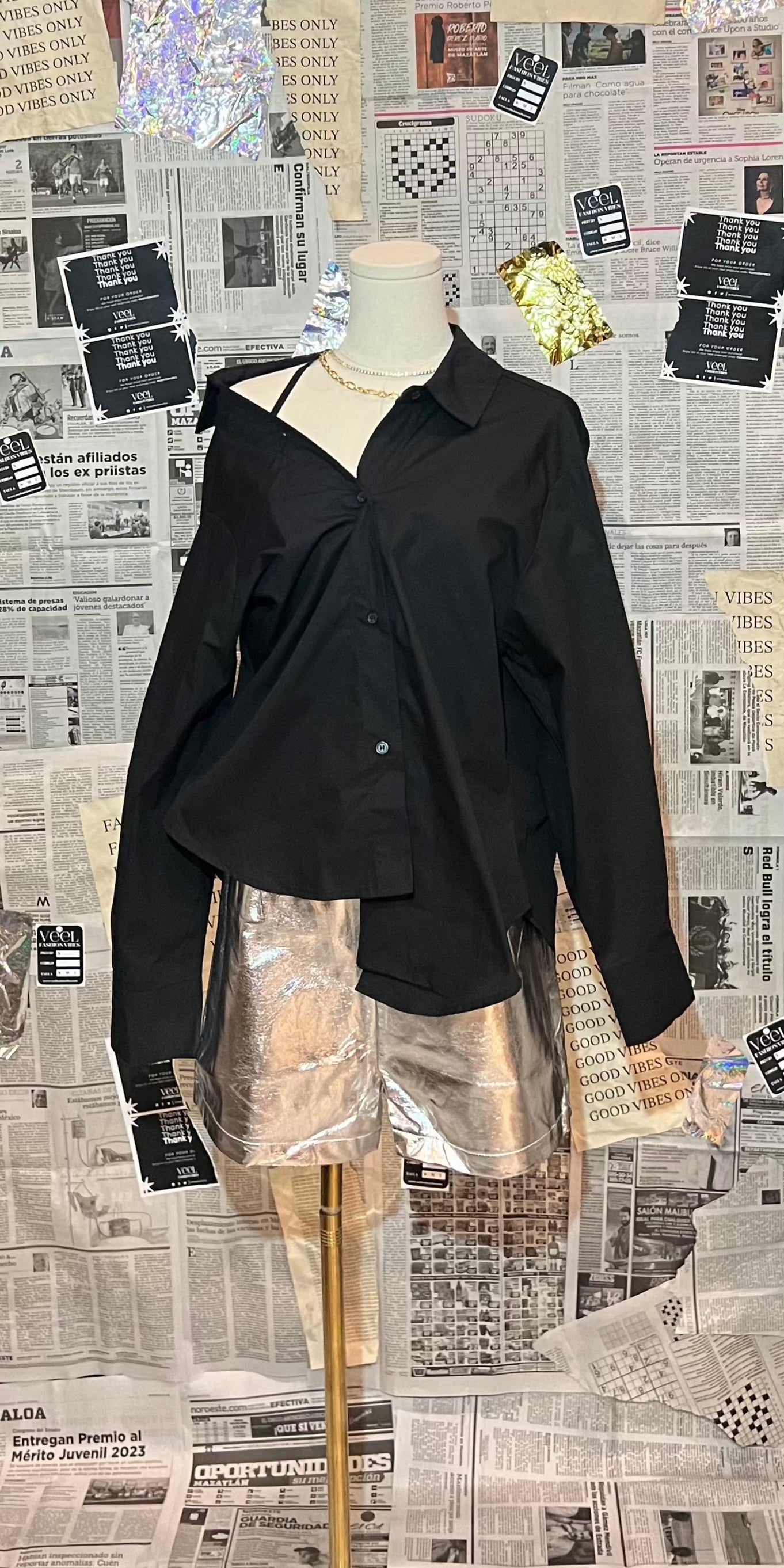Camisa asímetrica off the shoulder