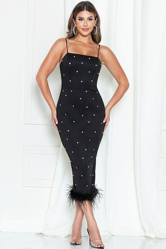 Vestido midi con bastilla de plumas